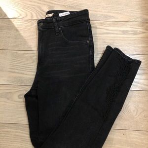 Levi’s high rise skinny with fringes